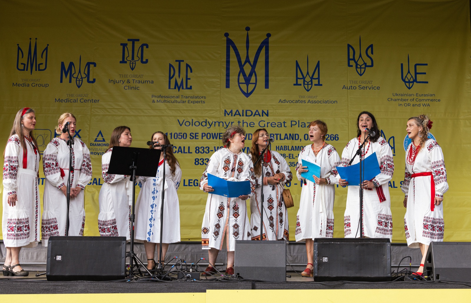 Cultural performers singing on stage at the Multicultural Kids Festival in Portland