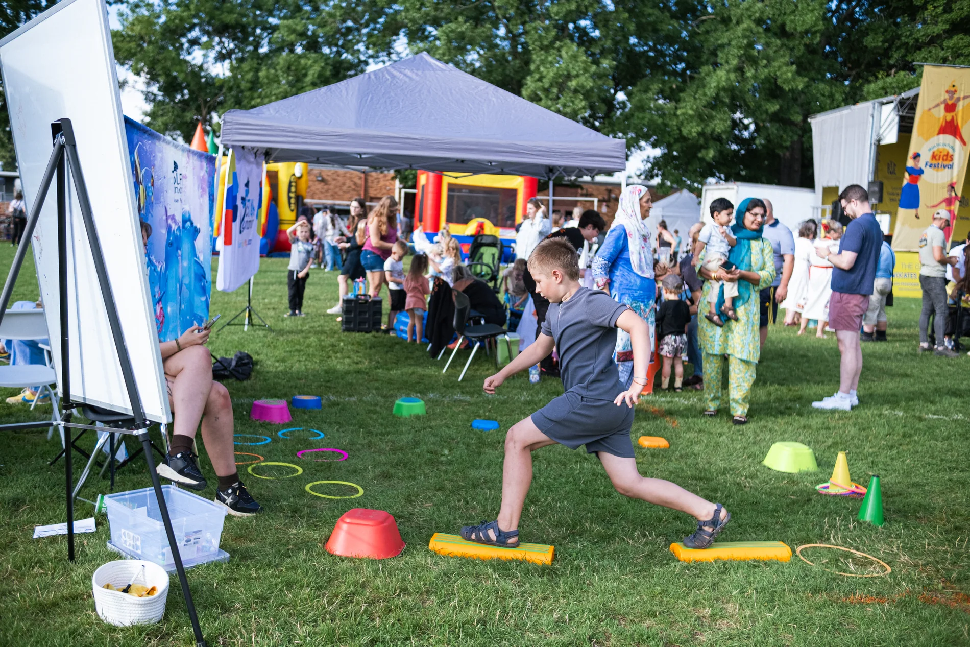 Kids activities, vendor booths, and families at the Multicultural Kids Festival in Portland